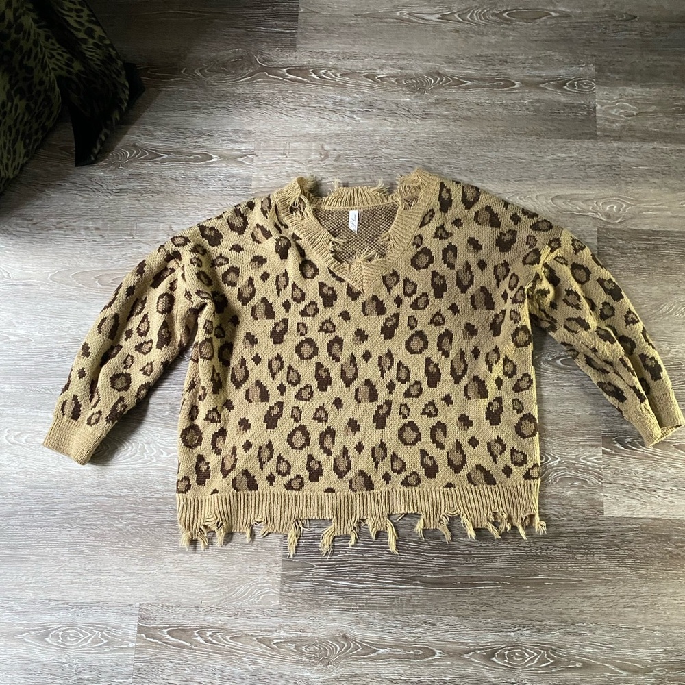 Women’s tattered edge leopard sweater